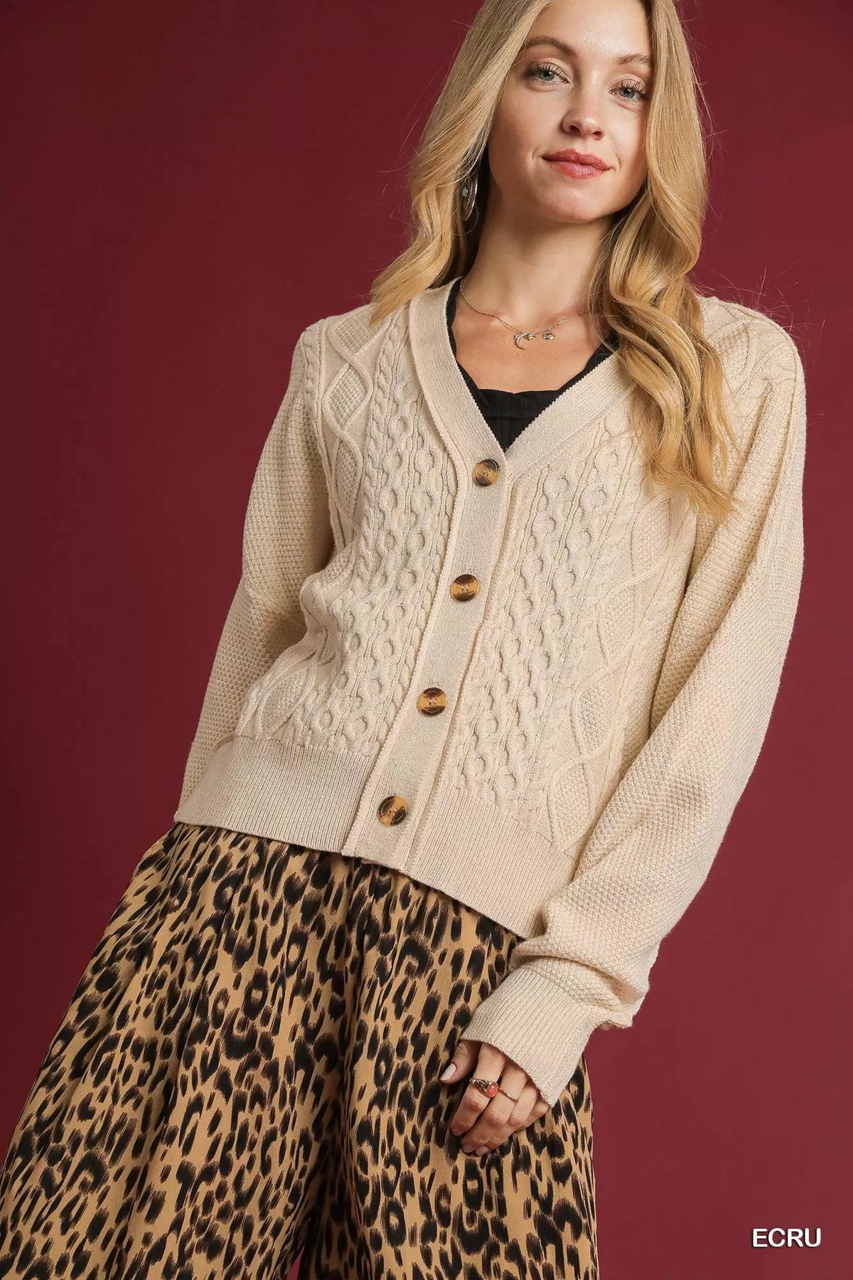 Ecru chunky cable knit v-neck button-up cardigan with wooden buttons