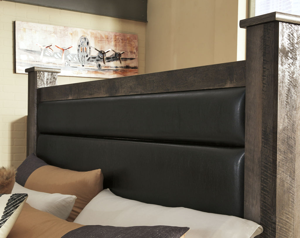 Gray upholstered bed headboard with matching wood side rails