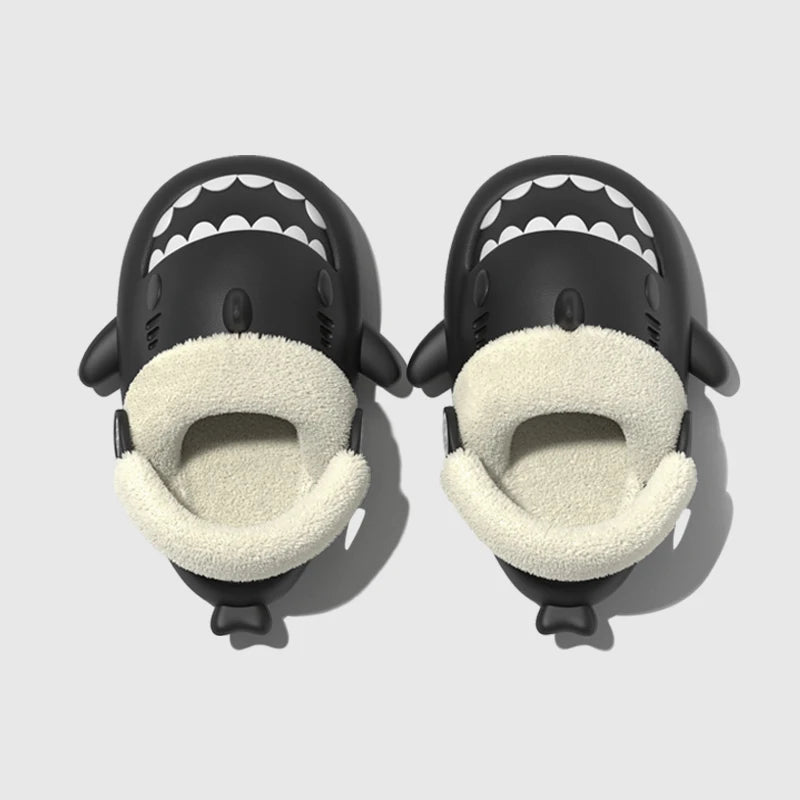 Black kids shark slippers with white tooth pattern and plush interior lining