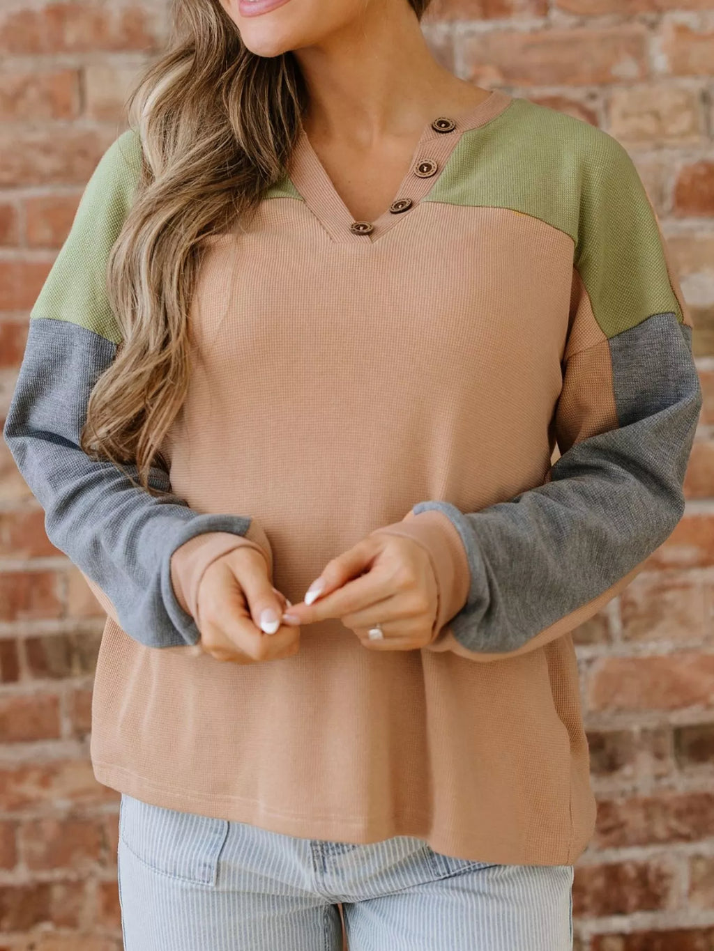 Color block thermal henley top with camel body, green yoke, and gray contrast sleeves