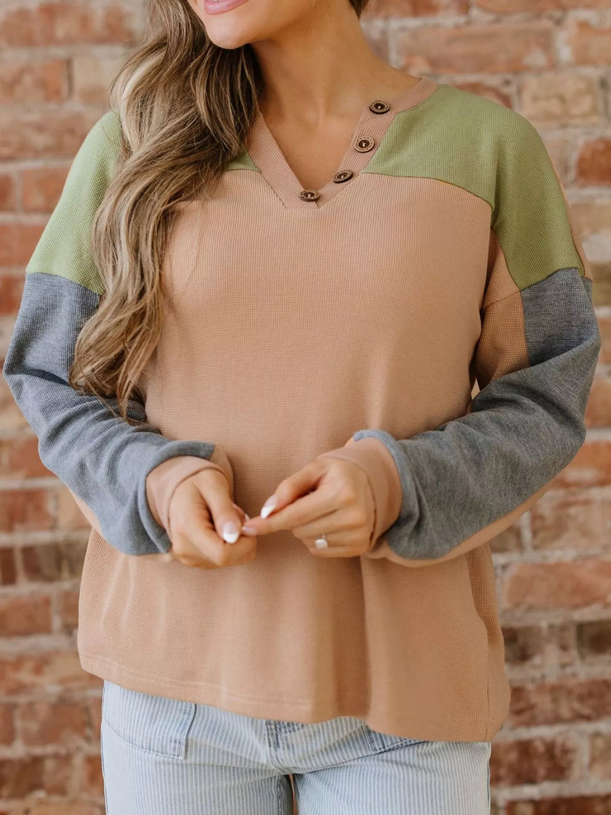 Color block thermal henley top with camel body, green yoke, and gray contrast sleeves