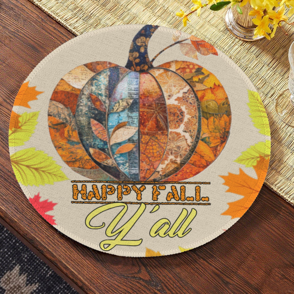 Close-up round beige place mat with layered pumpkin pattern and 'Happy Fall Y'all' wording