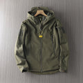 Men's waterproof shell jacket in dark olive green, front zip with multiple utility zips