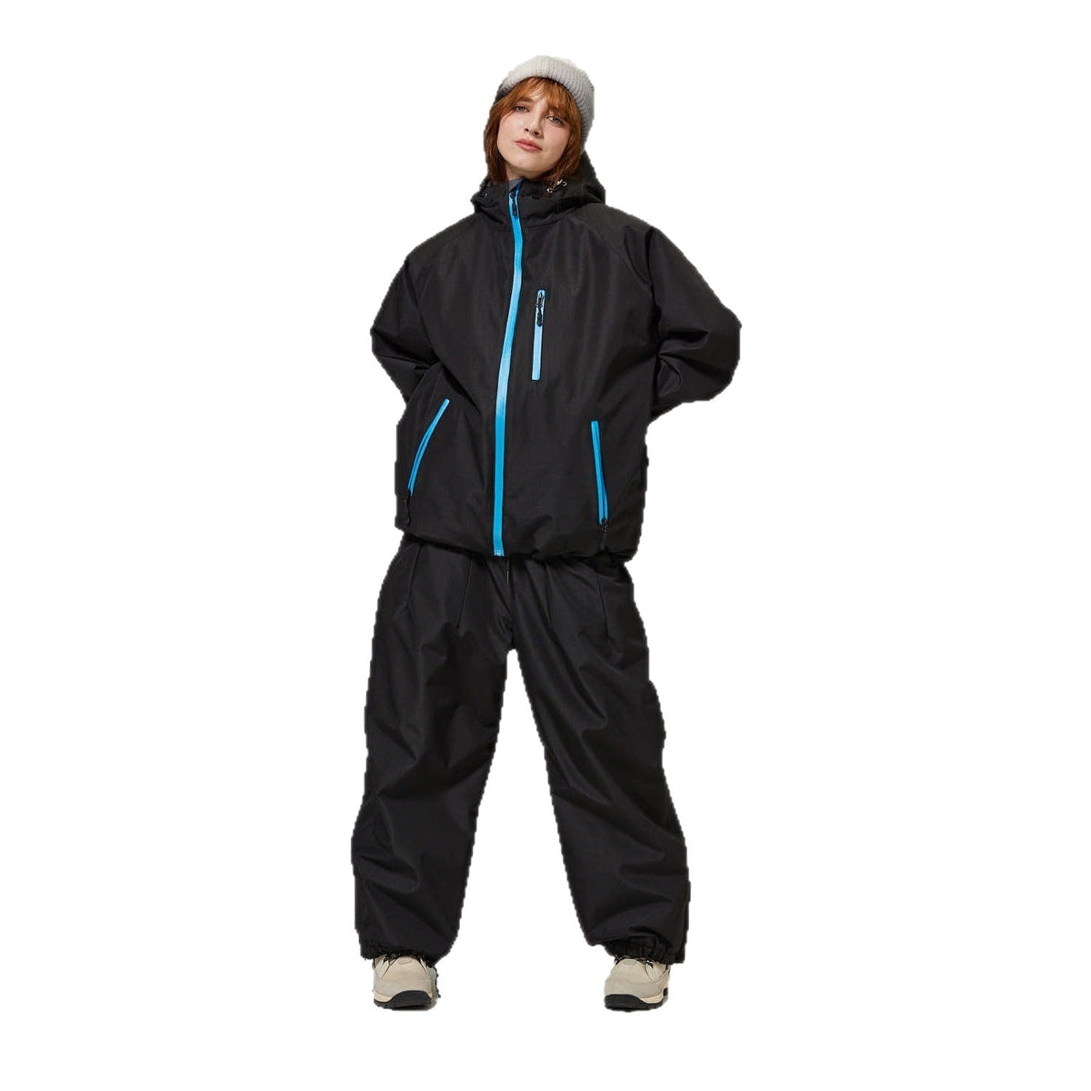 Black unisex ski suit set with hooded jacket, blue zipper details, and loose pants