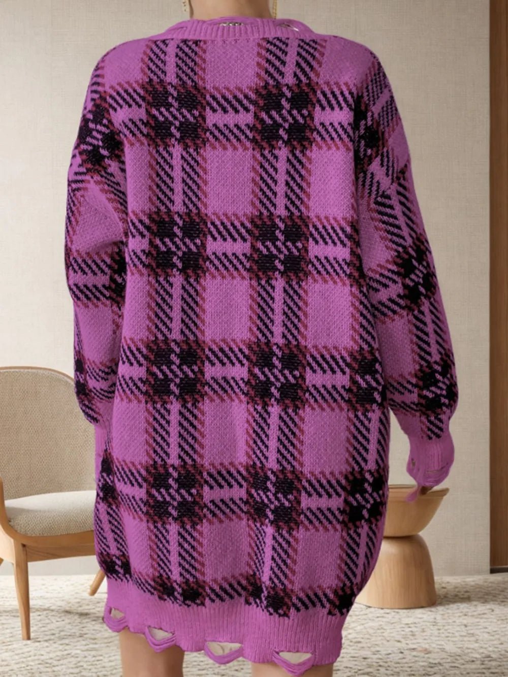 Back view of distressed plaid V-neck sweater dress, purple with black check pattern