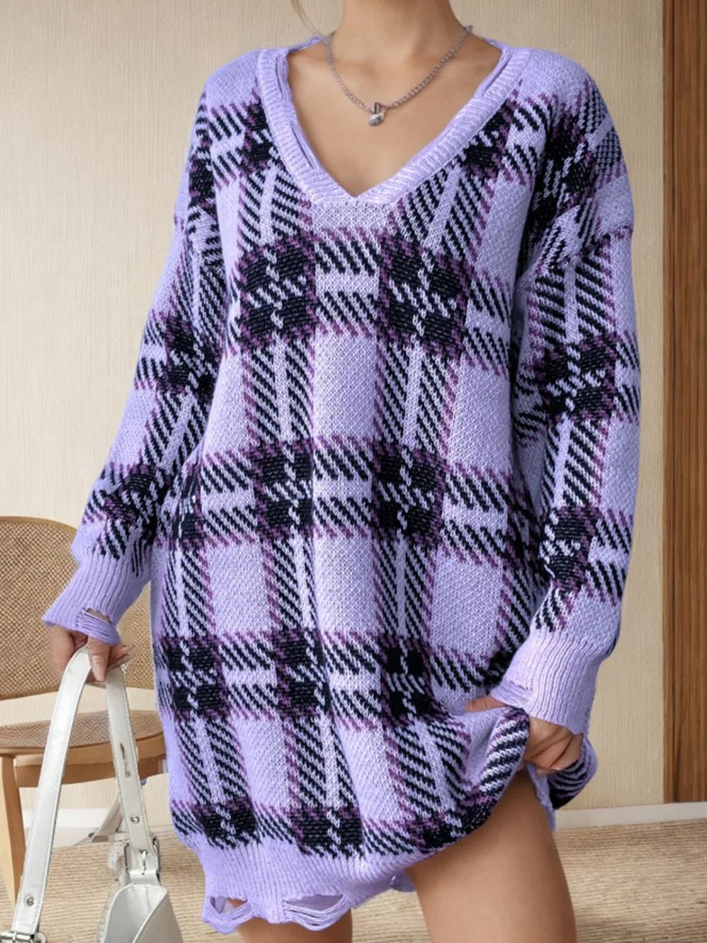 Distressed plaid V-neck sweater dress with long sleeves, lavender with black check pattern