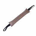 Beige leather dog training bite pillow with carrying loop handle, rectangular