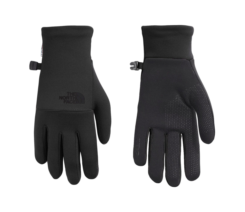 Women's black touchscreen gloves with textured dotted grip palm, logo patch