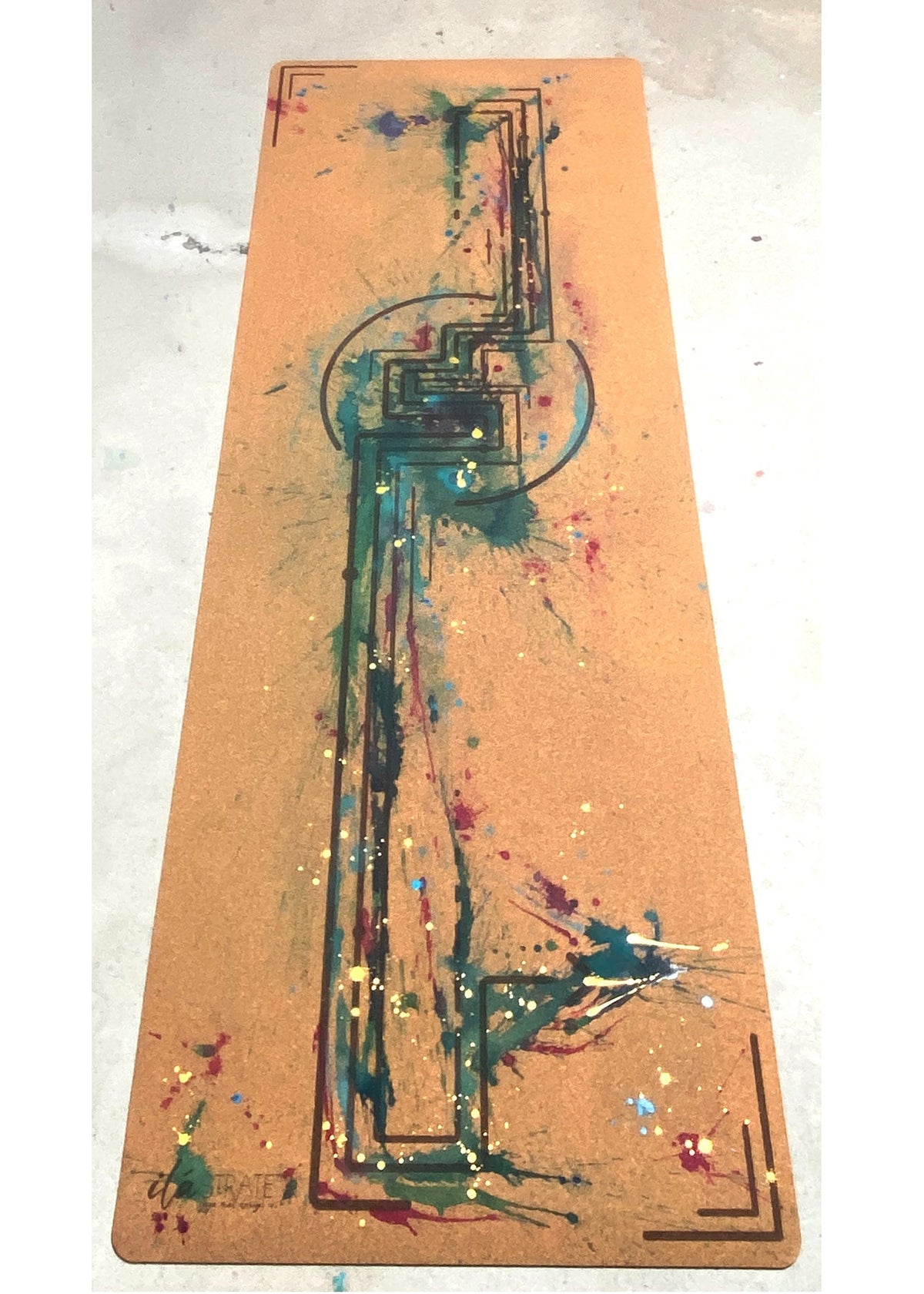 Full cork yoga mat with colorful abstract dragon-inspired artwork and geometric line details
