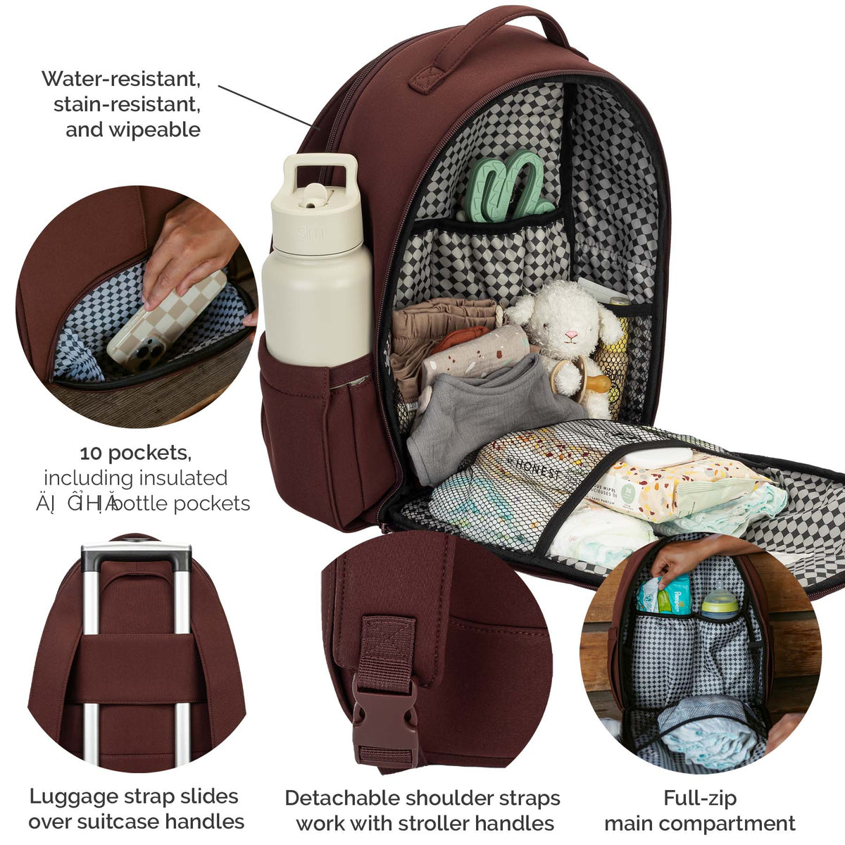 Wine-brown diaper backpack open, showing insulated bottle pocket and multiple compartments