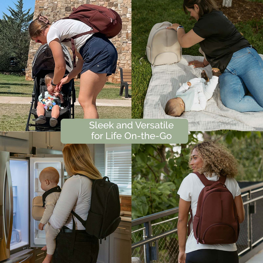 Wine-brown diaper backpack worn outdoors with full front pocket and zipper closure