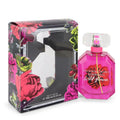Pink eau de parfum spray bottle with floral label, in decorated Bombshell Wild Flower box
