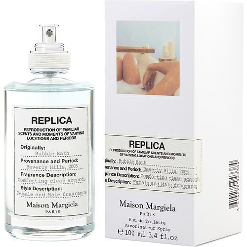 Eau de toilette spray bottle and retail box; clear glass, white label, 100 ml