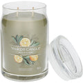 Large jar candle in glass with Sage & Citrus label, green wax, clear lid