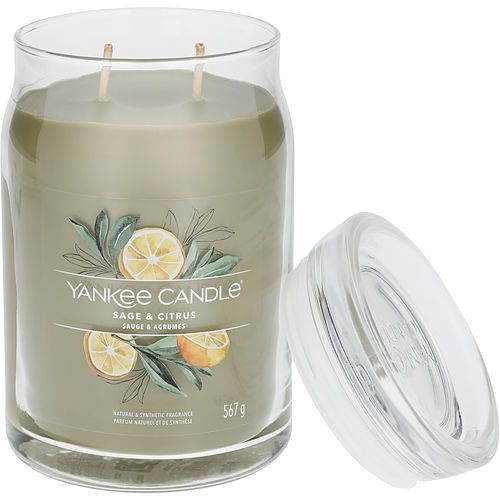 Large jar candle in glass with Sage & Citrus label, green wax, clear lid