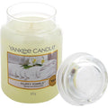Large jar candle with clear lid, pale yellow wax, 'Fluffy Towels' label