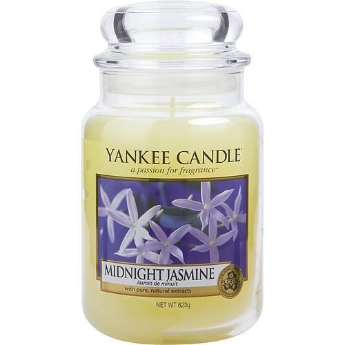 Large glass jar scented candle with Midnight Jasmine label and cream wax