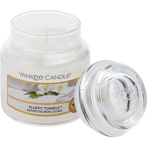 Small scented candle jar with lid, white glass, Fluffy Towels label.