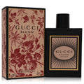 Gucci Bloom Intense Eau de Parfum spray: black bottle with cap and floral gift box