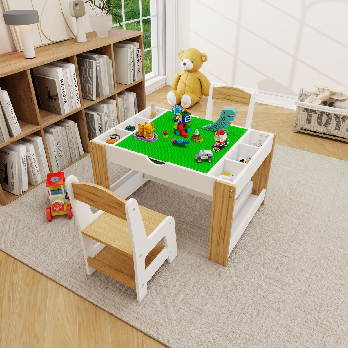 2-in-1 play table with green building surface, two white chairs, side storage bins