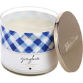 Gingham scented candle in blue and white, clear wax jar with gold lid open
