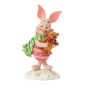 Piglet mini figurine hugging a small teddy bear, in green and pink striped outfit