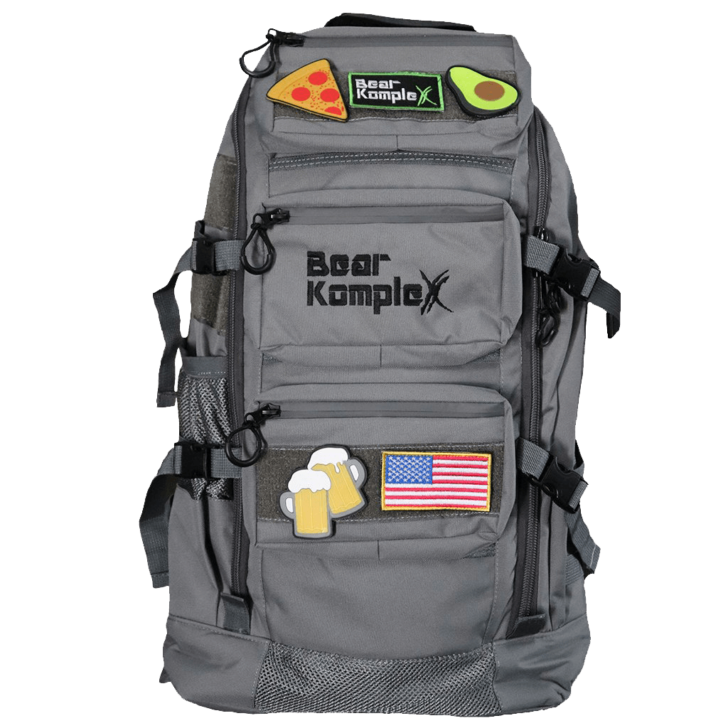 Grey military backpack with front organizer pockets, side straps, and patch details