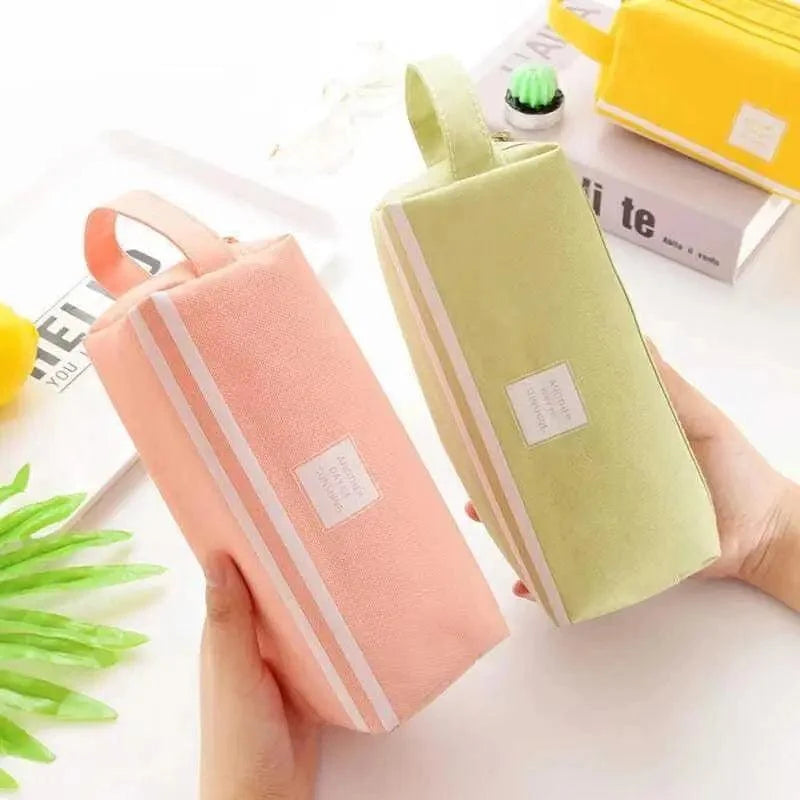 Large double-layer pencil case in pink and pale green, striped front and zip closure
