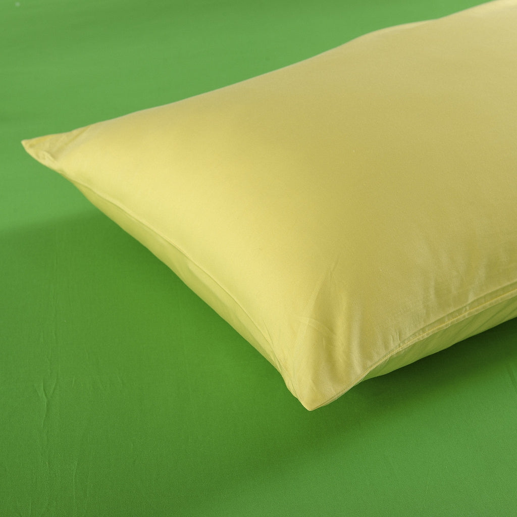 Banana yellow cotton pillow sham with smooth solid fabric and stitched edge detail