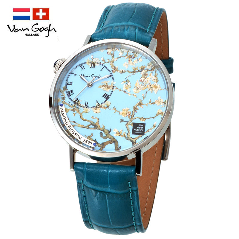 Women's quartz wristwatch with teal leather strap and silver round case, blue floral dial