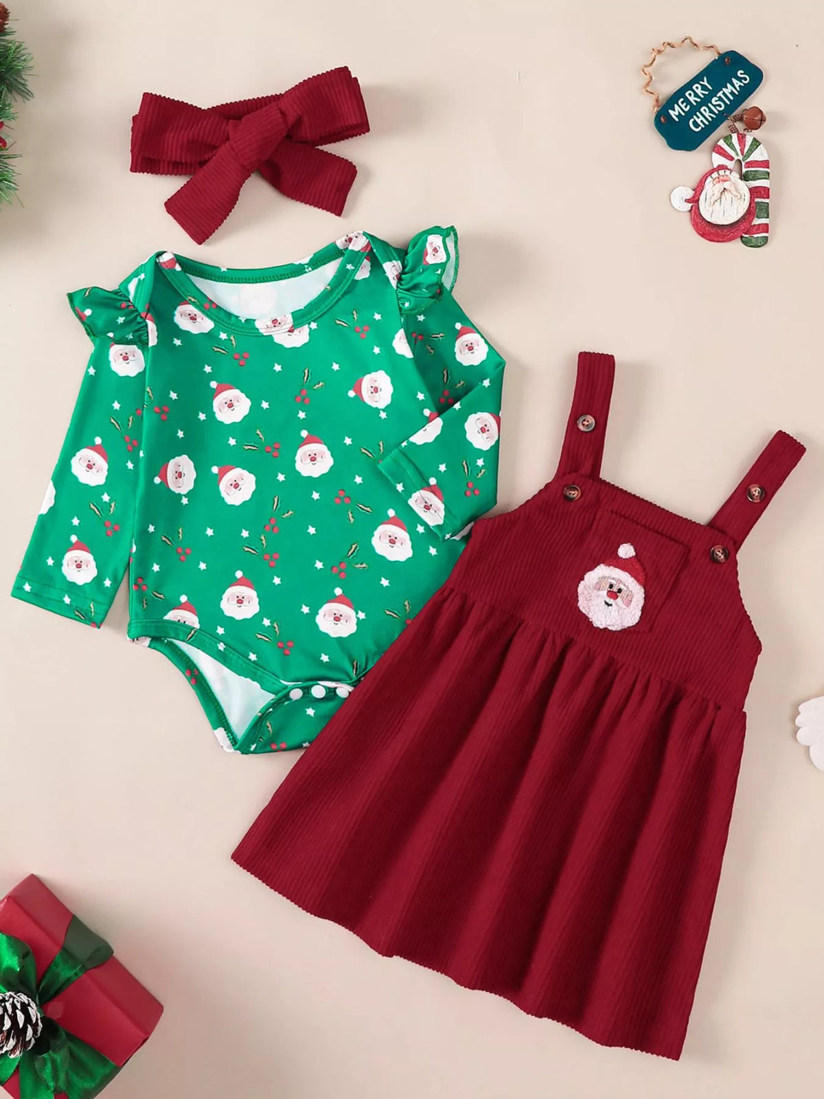 Green holiday-print bodysuit with burgundy overall dress and bow headband