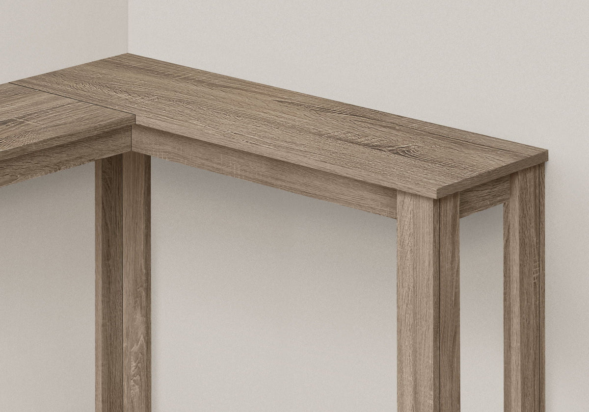 Corner accent console table corner top detail in light brown wood tone with straight edges.