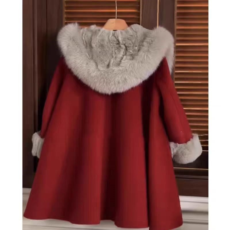 Red wool coat with large fur hood collar and fur-lined cuffs