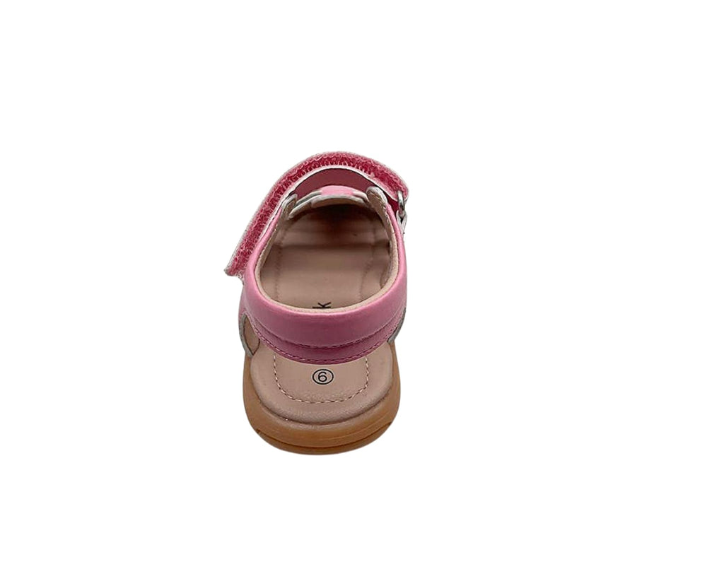 Kids closed-toe sandal back view in pink with beige interior and tan sole
