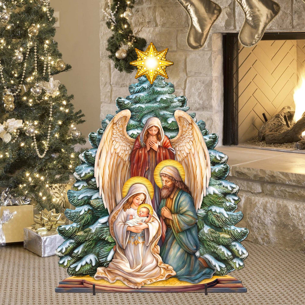 Outdoor nativity decor featuring Mary holding baby Jesus, Joseph, and angel wings under star