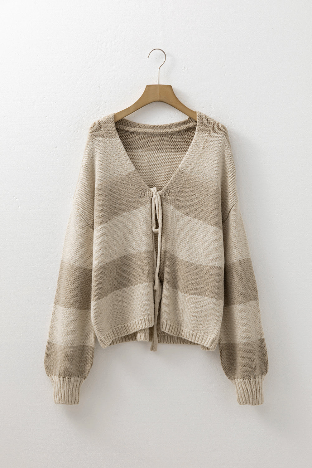 Khaki striped colorblock knit cardigan on hanger with V-neck drawstring tie