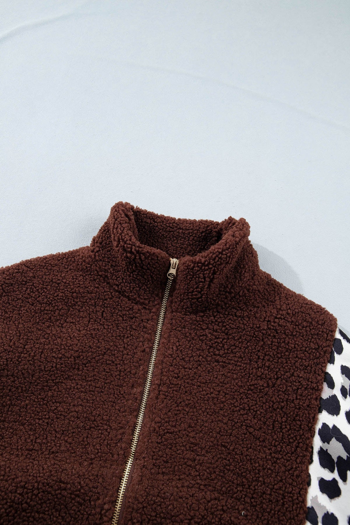 Brown sherpa zip-up jacket with stand collar and front zipper detail
