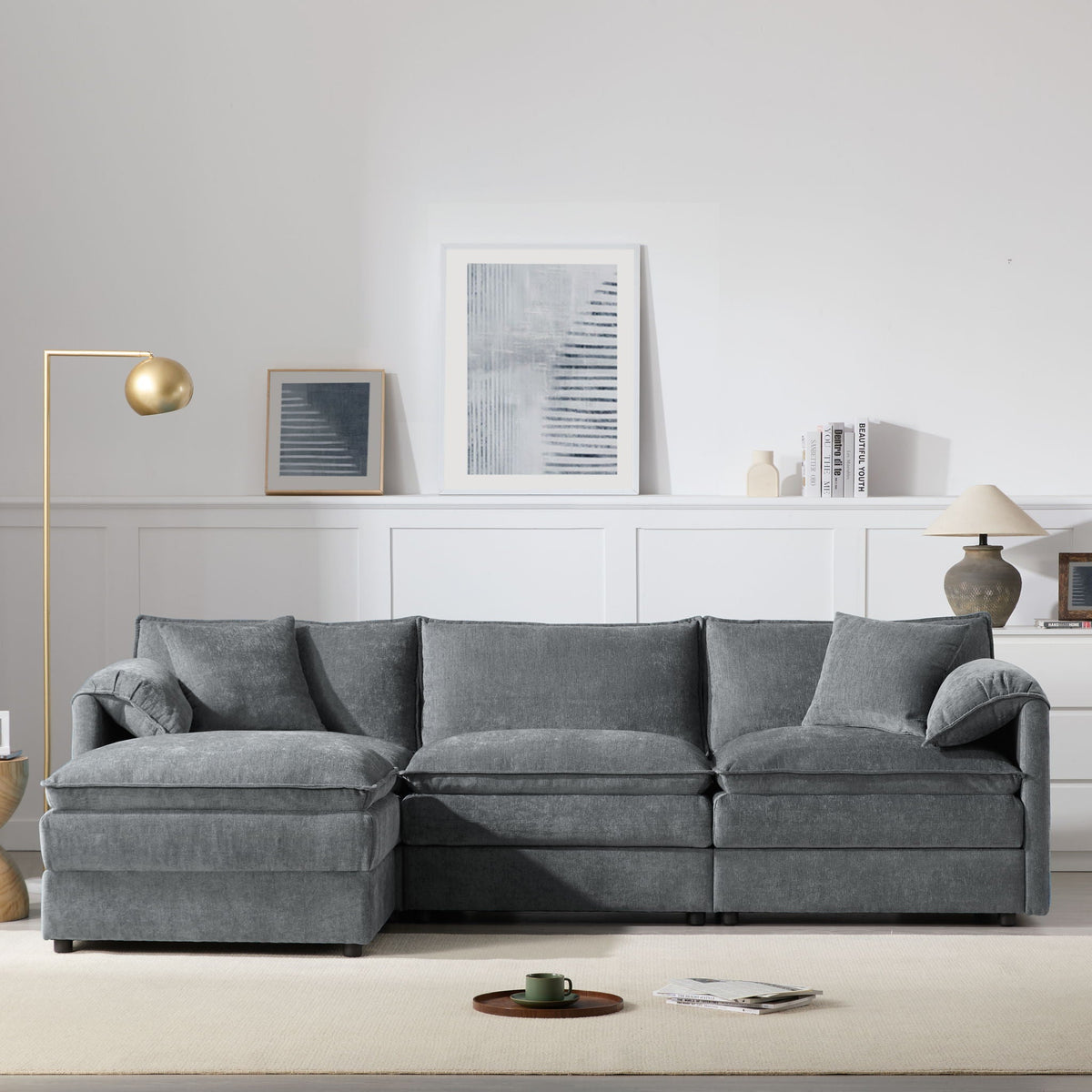 Dark gray 3-seat sectional sofa with armrests and left chaise ottoman