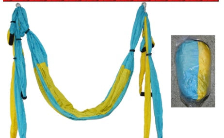 Teal and yellow yoga swing hammock with hanging fabric loops
