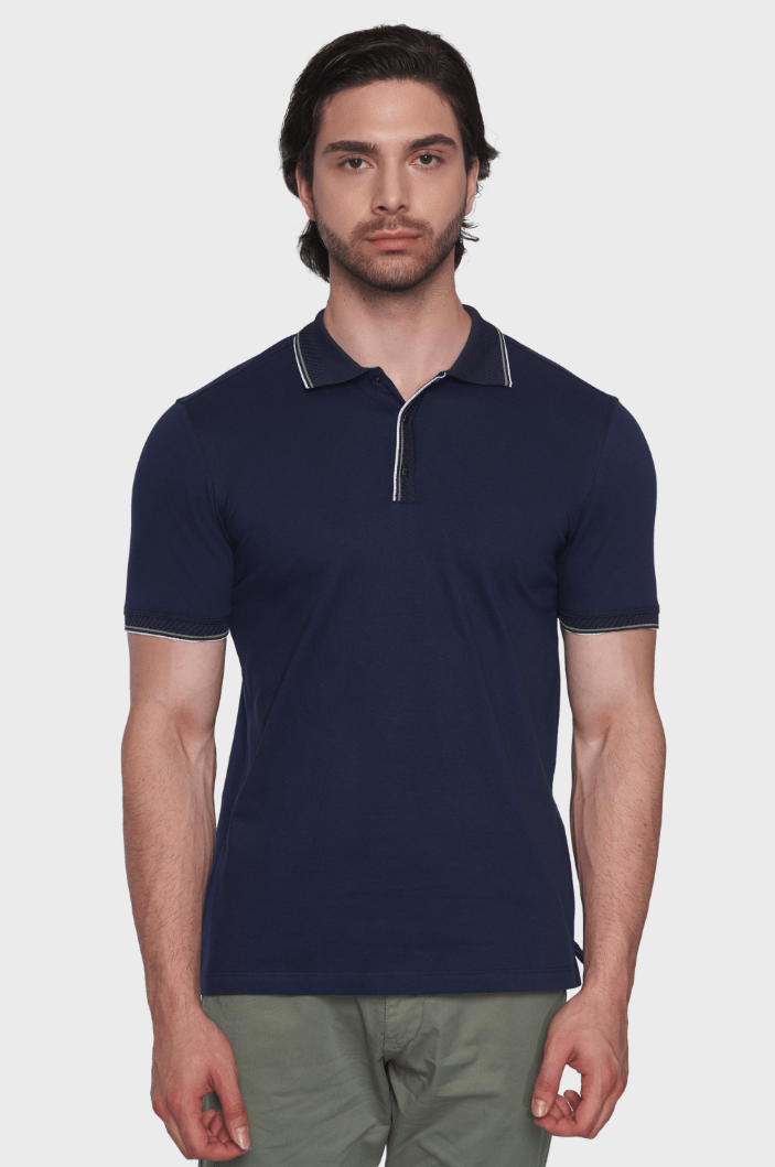 Navy mercerized cotton polo with ribbed collar, striped placket trim, and half-zip