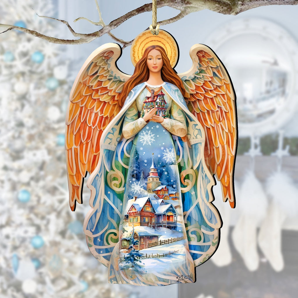 Wooden angel ornament with orange-gold wings and blue dress holding a nativity scene
