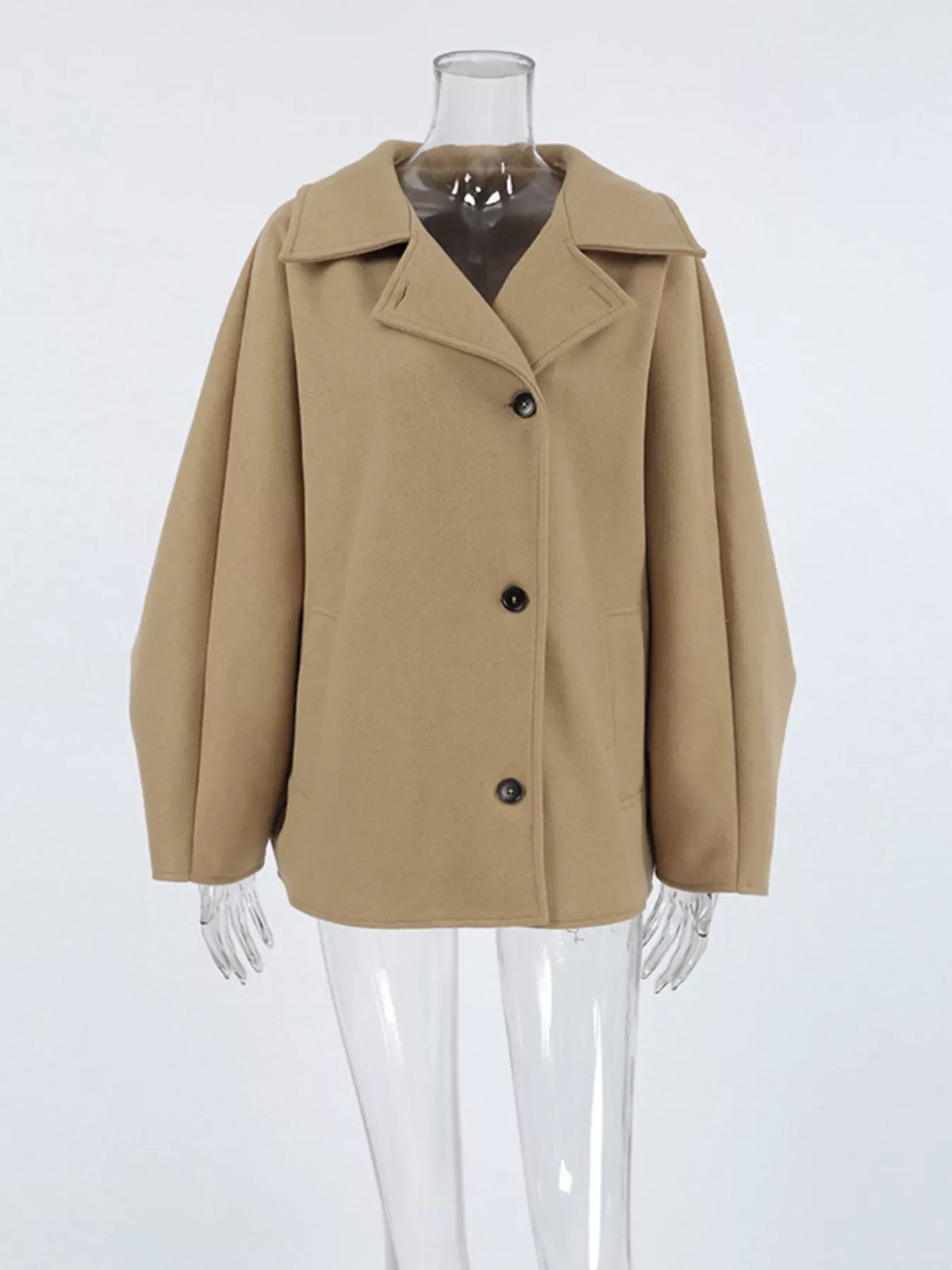 Khaki button-up long-sleeve coat on mannequin with notched collar and front buttons