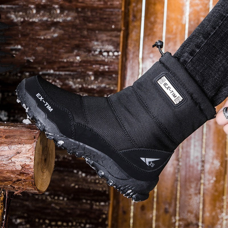 Black waterproof snow boot with fleece lining and rugged winter tread outsole.
