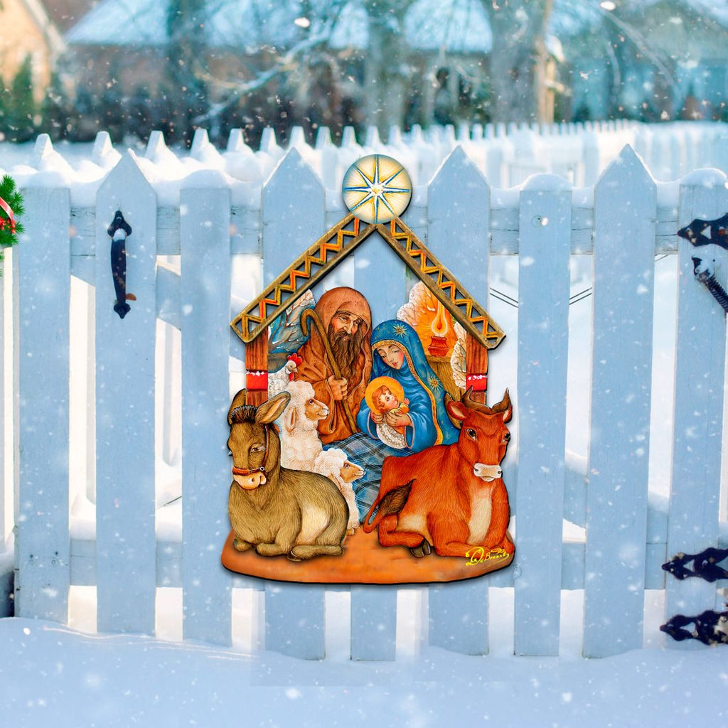 Nativity wooden door decor with manger scene, Mary and Joseph, donkey and cow, and star