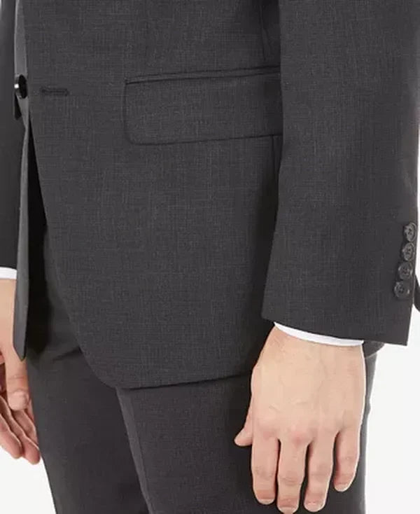Men's suit jacket side detail, flap pocket and sleeve cuff, dark charcoal
