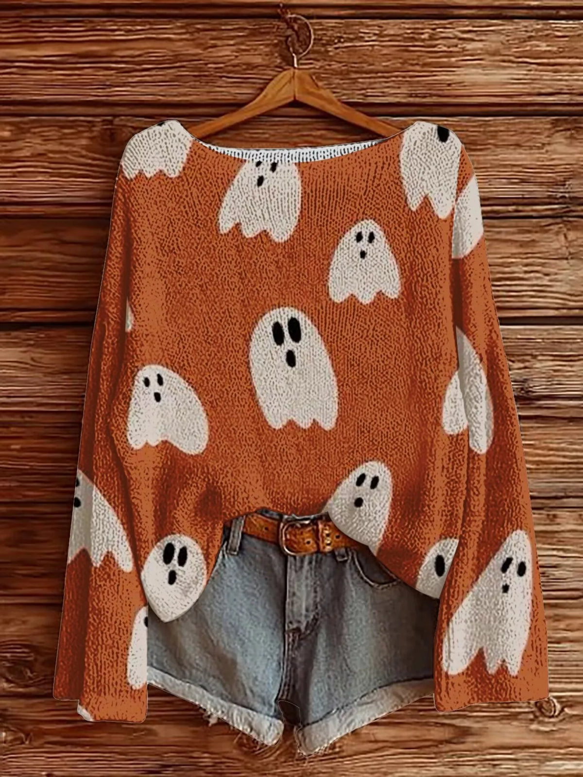 Orange Halloween boat-neck sweater with ghost and jack-o'-lantern graphic prints