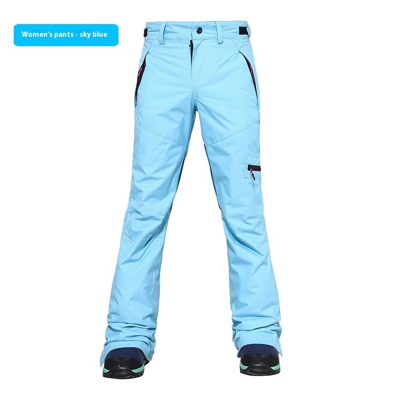 Women's ski pants in sky blue, slim fit with side pocket and padded ankle cuff