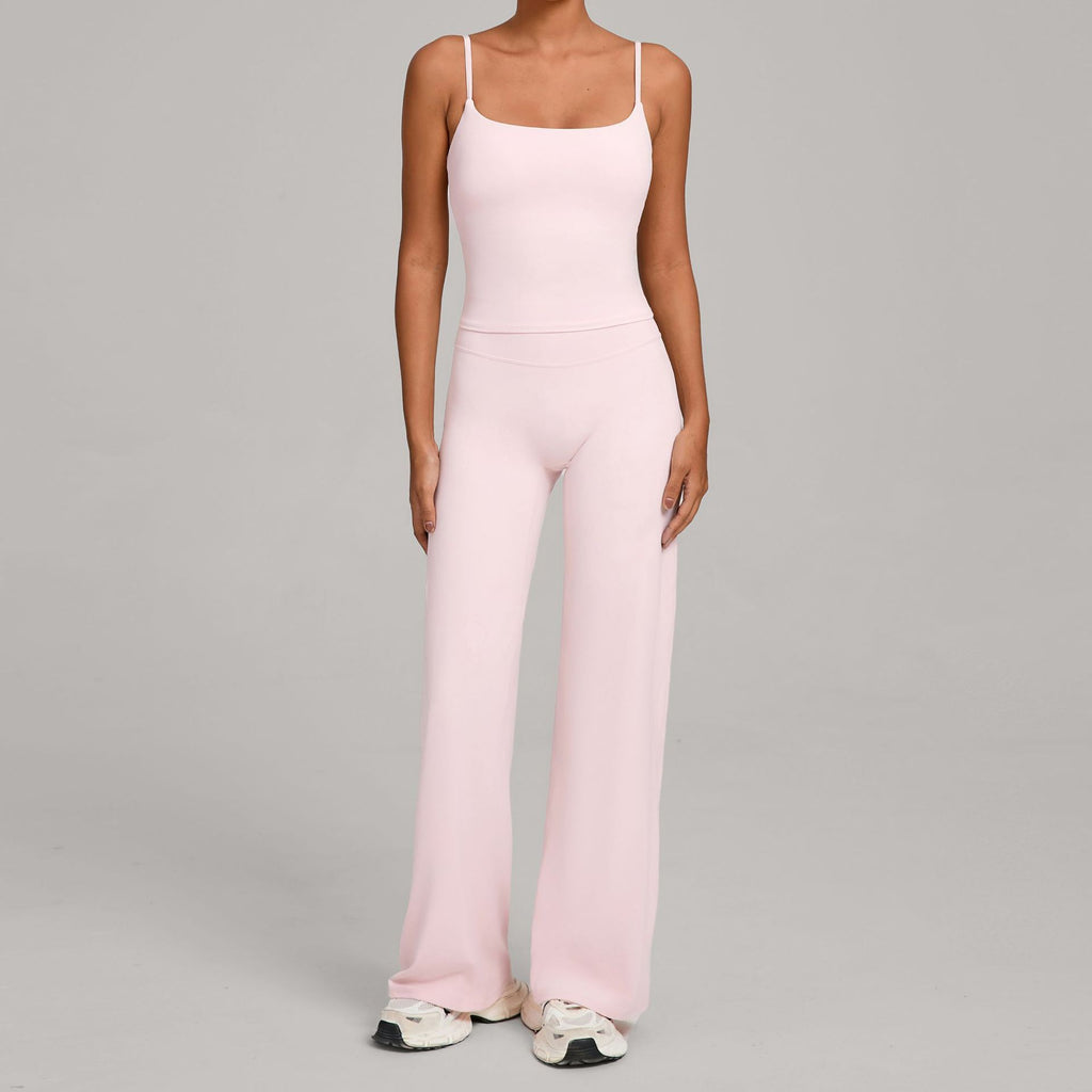 Women's yoga suit in light pink, spaghetti-strap crop top and wide-leg pants