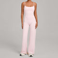 Women's yoga suit in light pink, spaghetti-strap crop top and wide-leg pants