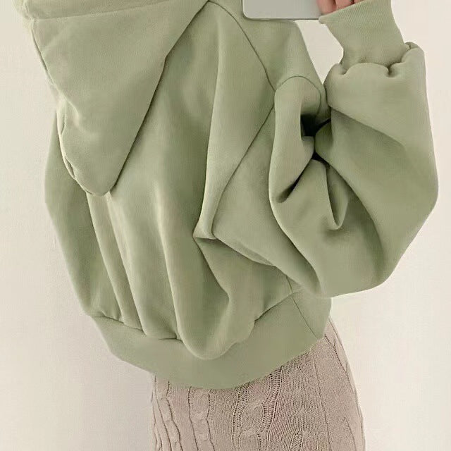 Women's hooded sweater, loose fit, light green pullover with hood and kangaroo pocket